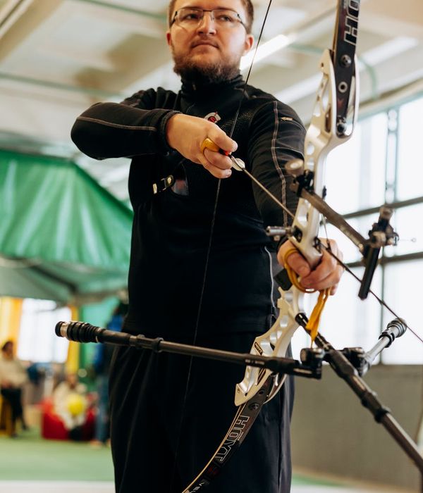 Woman feeling energetic and balanced in a bright, modern space.